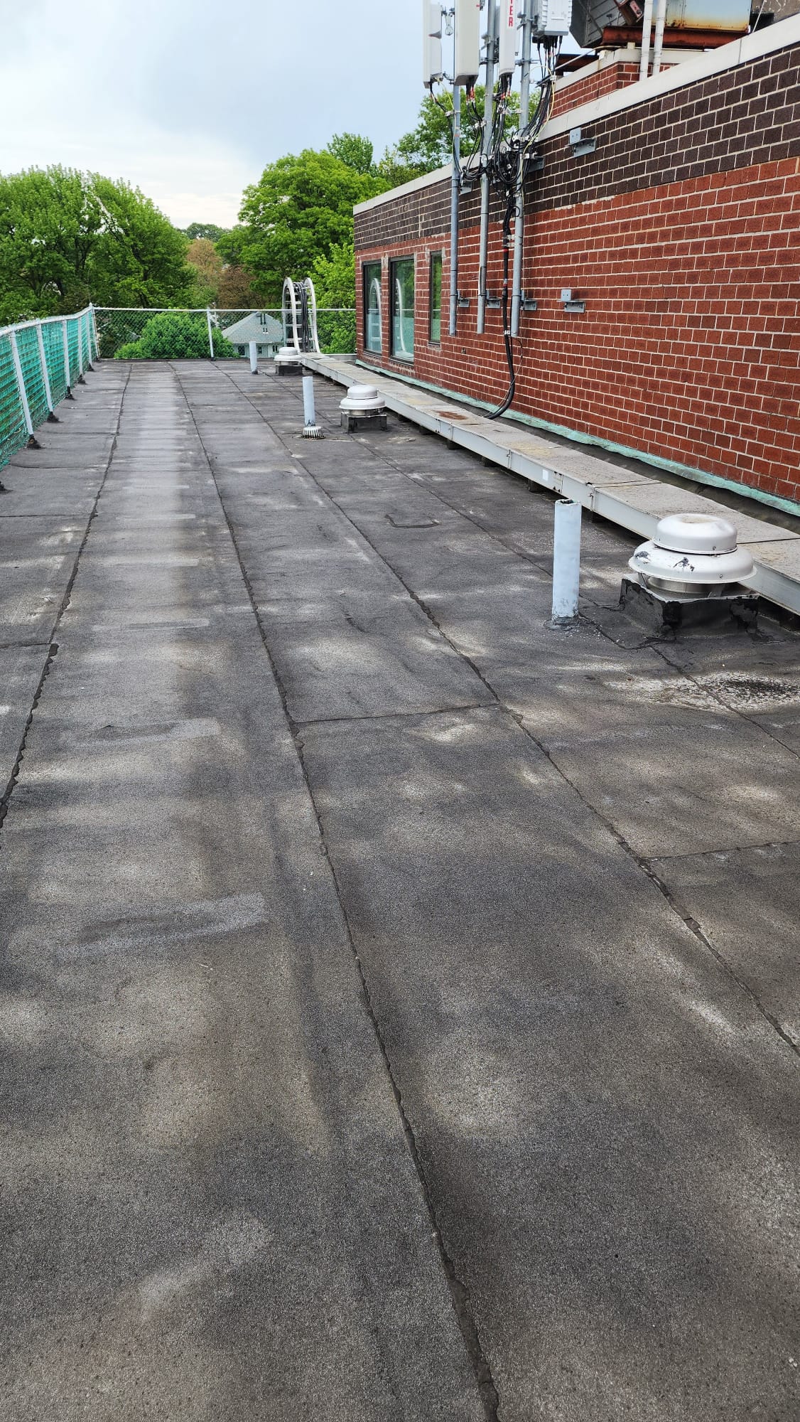 Damaged roof showing multiple signs of needed replacement